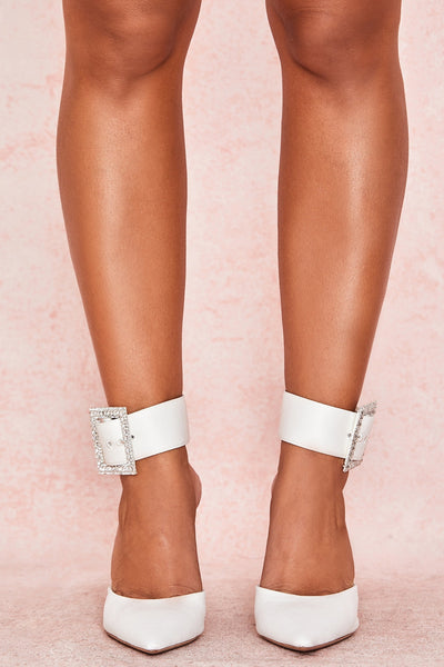 White crystal buckle pumps